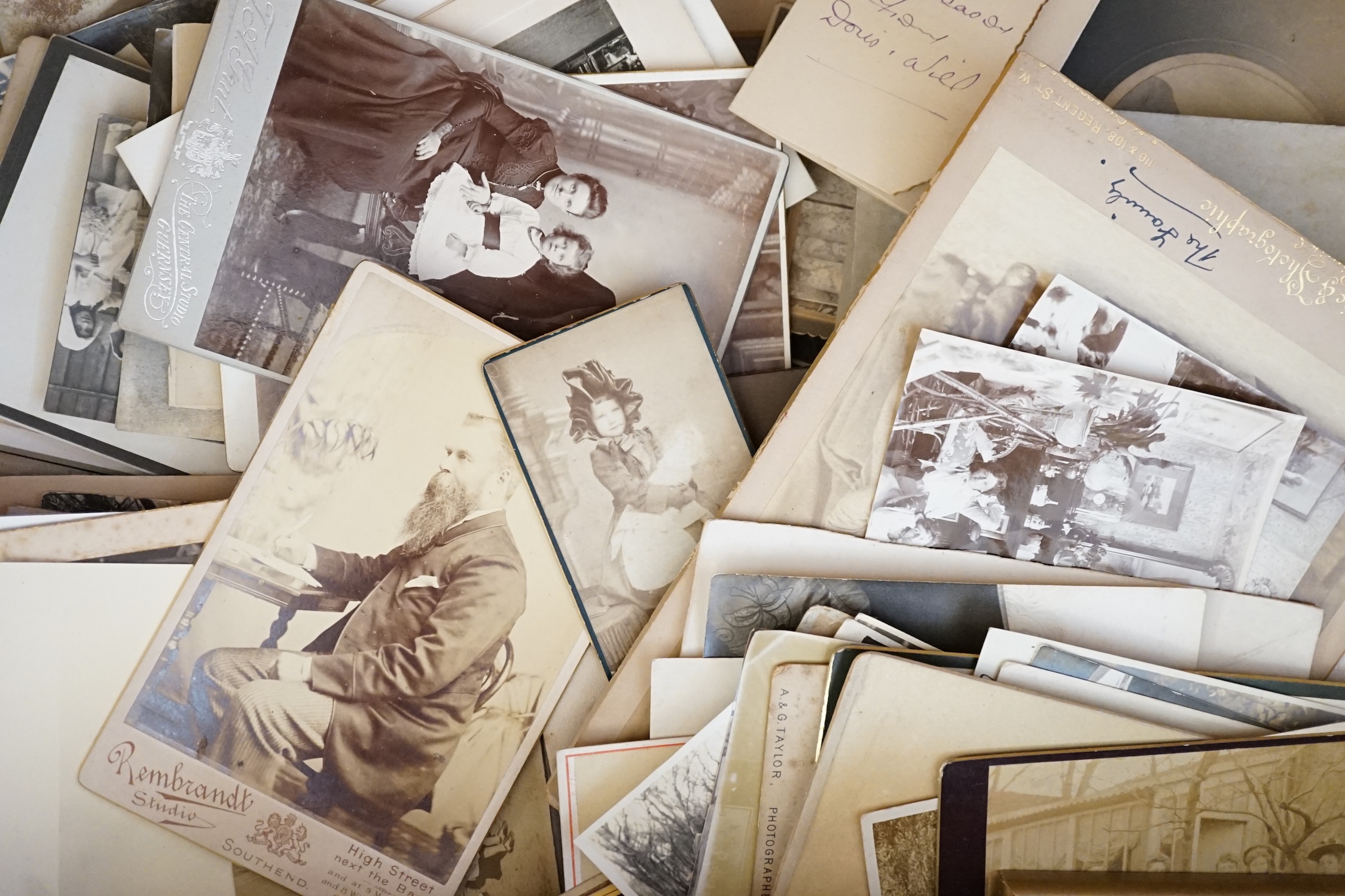 A large collection of 19th and early 20th century black and white wedding photographs together with topographical photos of the era, in three boxes. Condition - fair to good